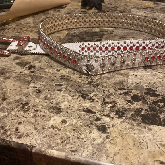 White and red bezel belt light wear and tear good shape. - Picture 2 of 3